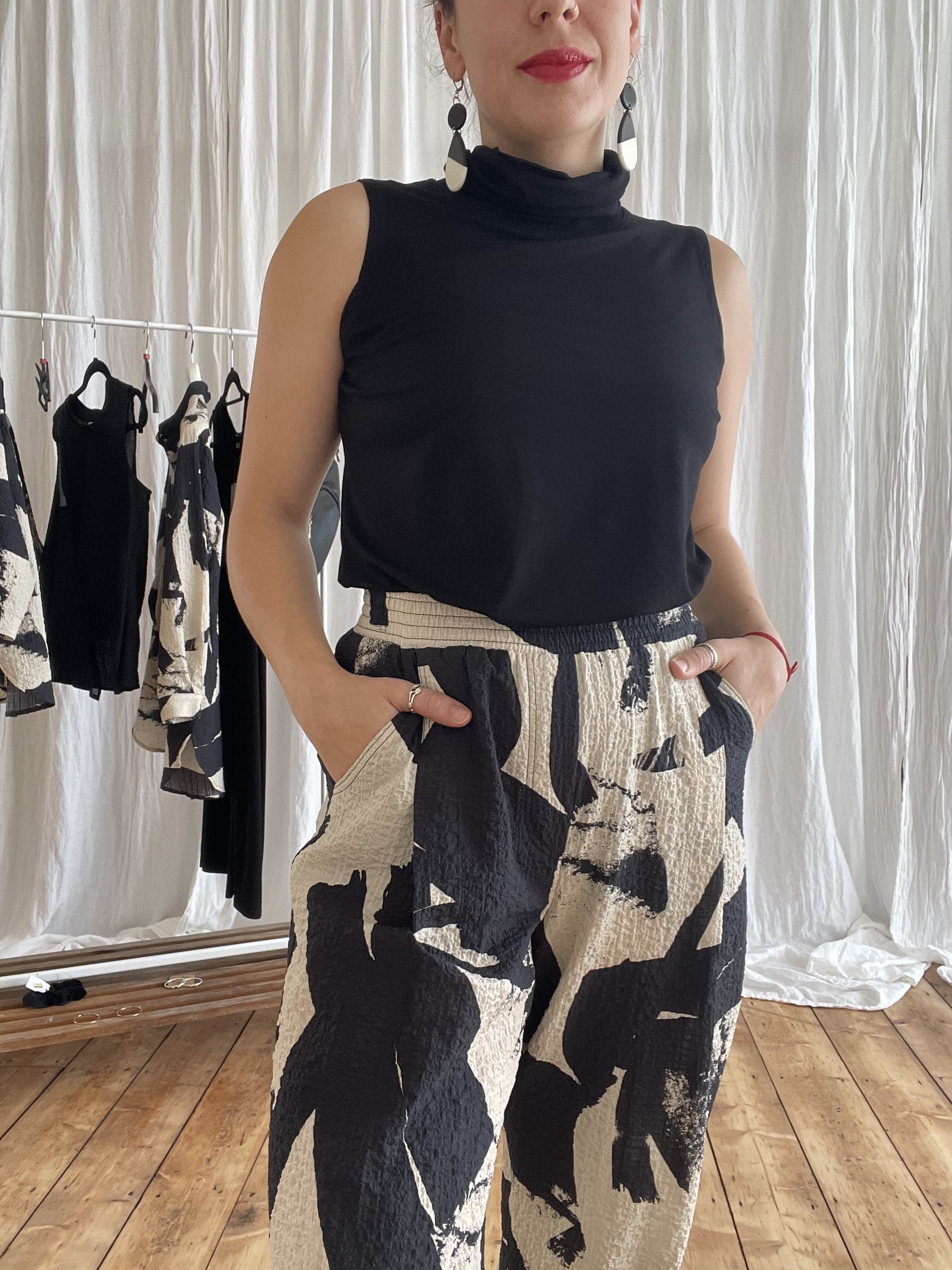 Mini roll neck sleeveless top - Black