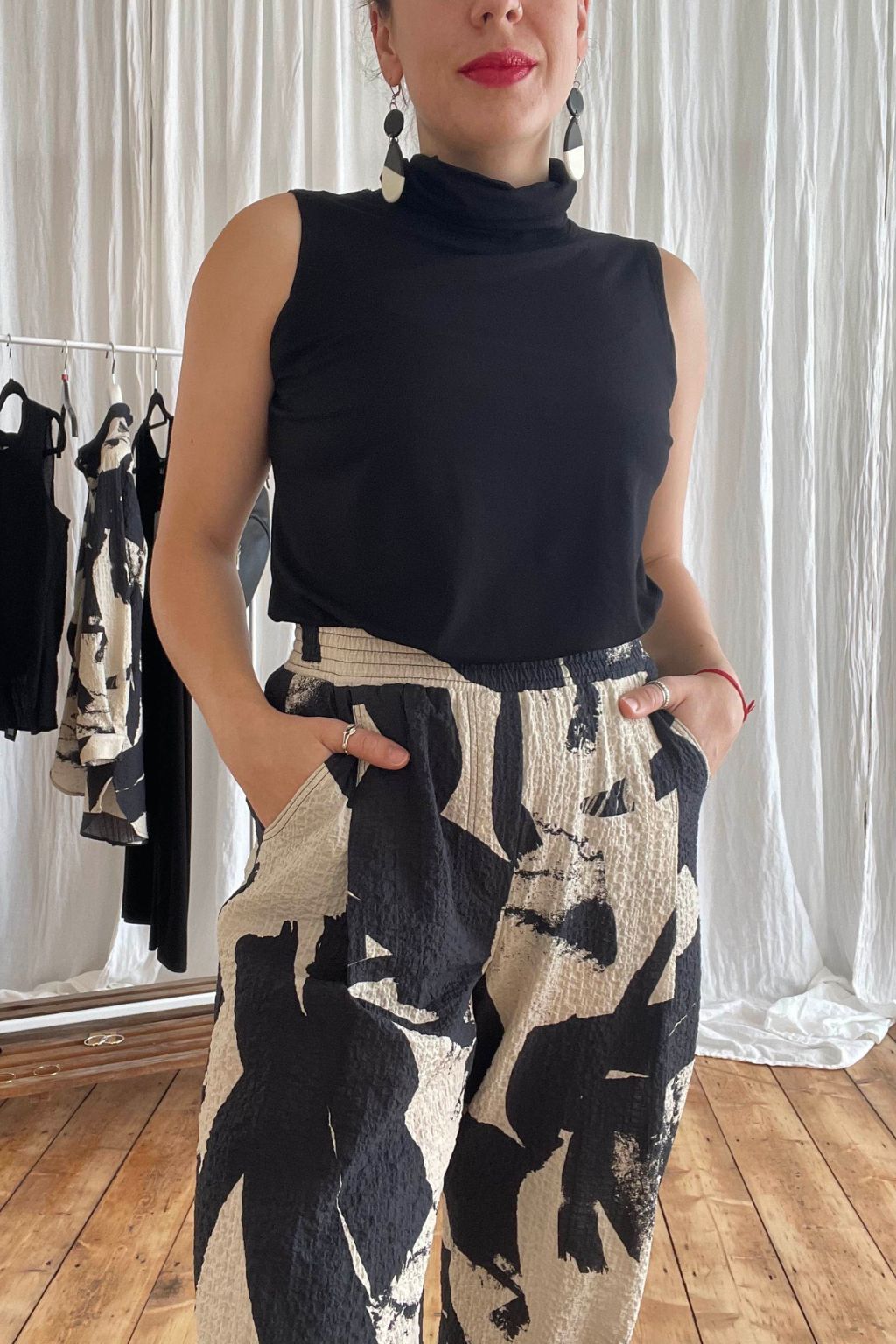 Mini roll neck sleeveless top - Black